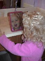 Testing Mommy's Lipstick....